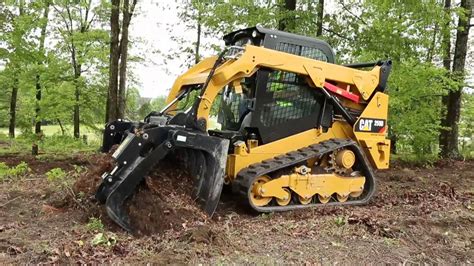 caterpillar skid steer grapple|cat skid steer attachments.